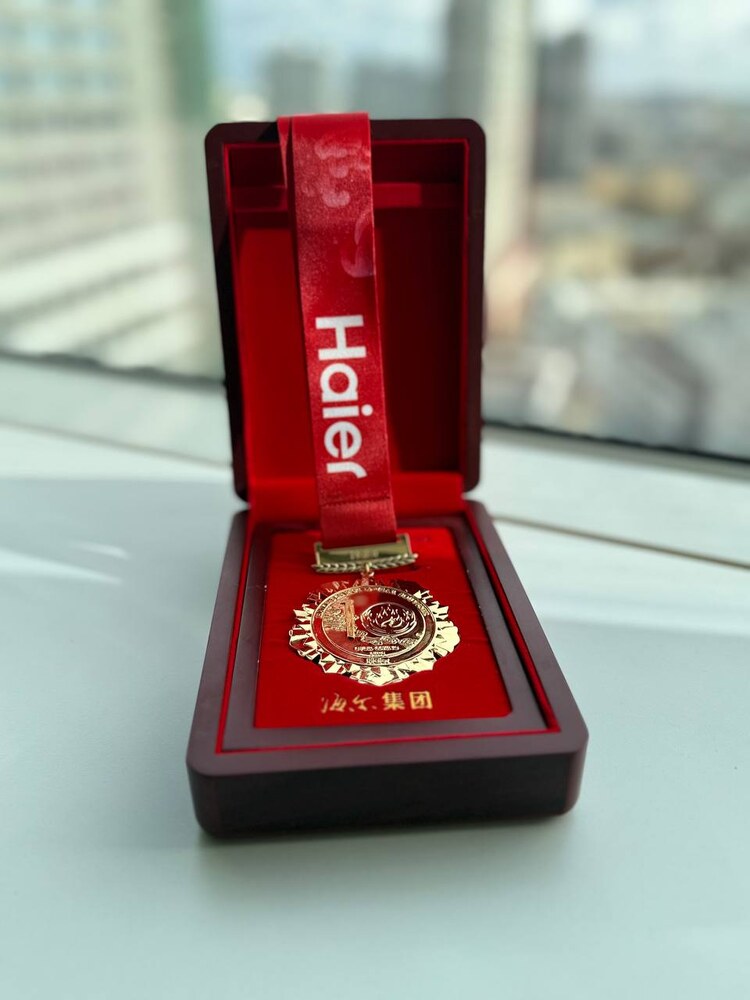 Медаль Haier